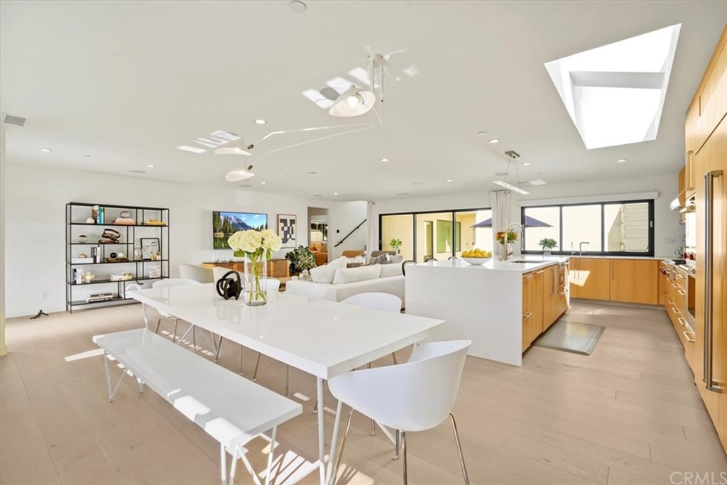361 Aster Street Laguna Beach, CA 92651 - Photo 9 of 25 a dining room with furniture and view of kitchen