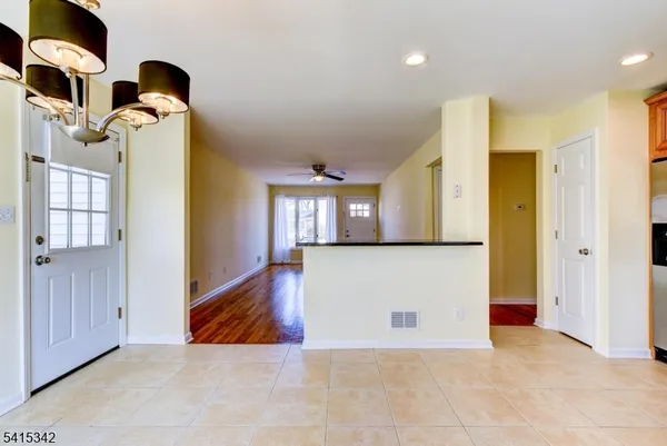 a view of entryway and hall with a window