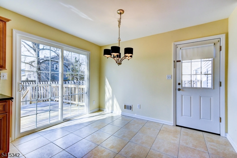 3 Michael Lane Somerville, NJ 08876 - Photo 17 of 31 a view of a room with wooden floor and windows