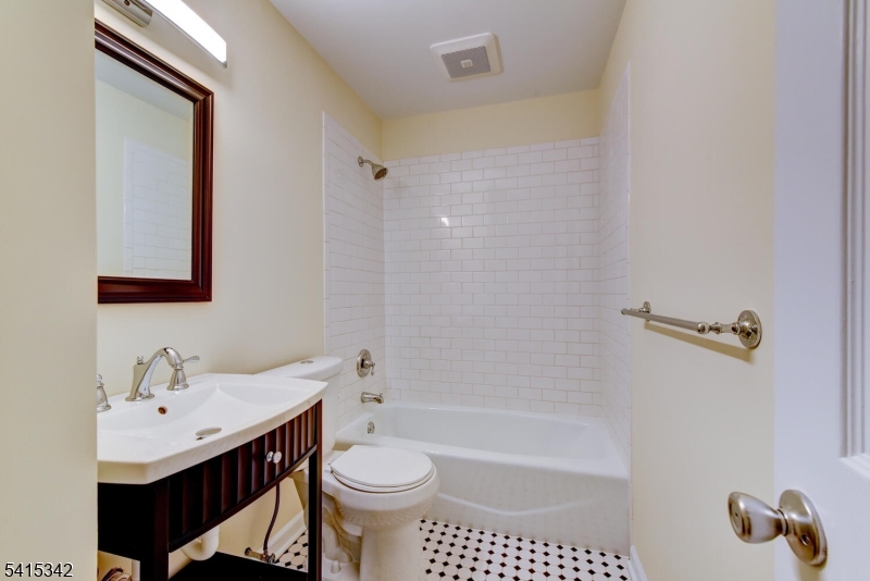 3 Michael Lane Somerville, NJ 08876 - Photo 18 of 31 a bathroom with a sink toilet a shower and bathtub
