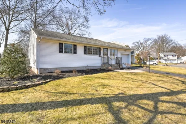 a front view of house with yard
