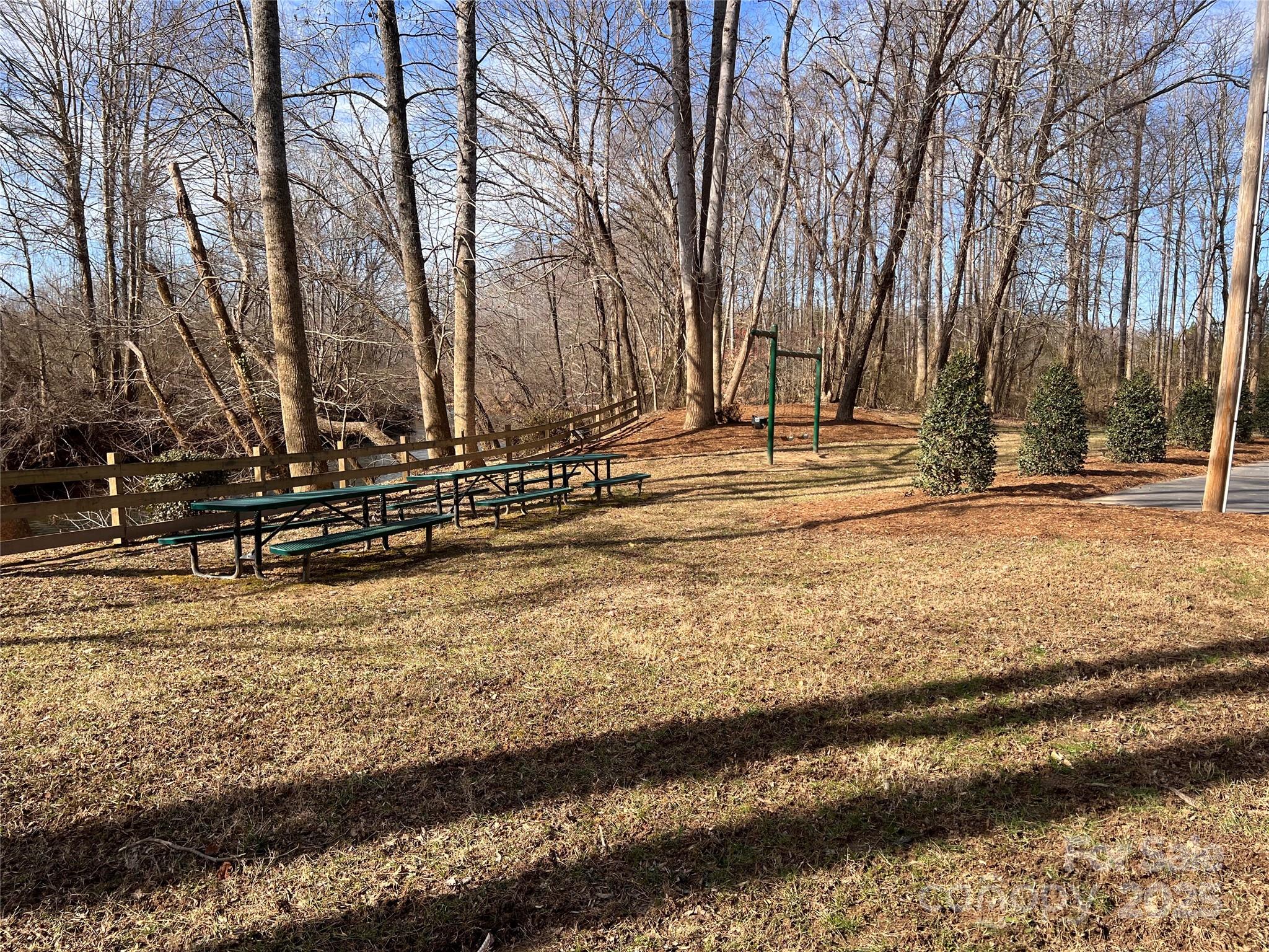 999 River Crest Parkway, Unit 28 Rutherfordton, NC 28139 - Photo 16 of 23 a view of a yard with trees