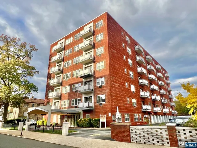 a kitchen with a sink a stove and washer