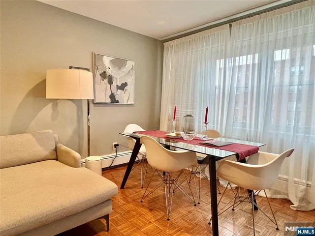 a workspace with furniture and a window