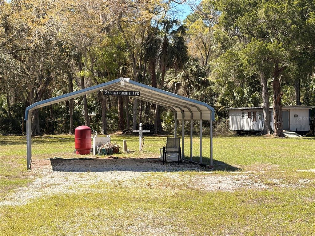 276 Marjorie Street Inglis, FL 34449 - Photo 3 of 5 a view of swimming pool with a patio