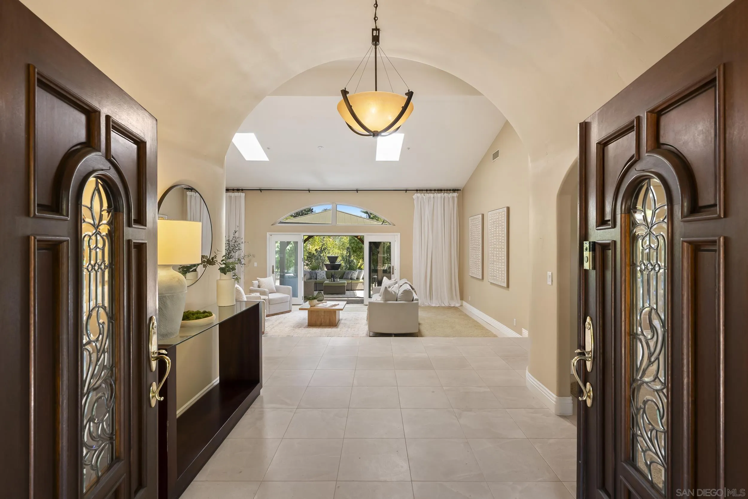 14998 Budwin Lane Poway, CA 92064 - Photo 12 of 44 a view of living room kitchen and entryway