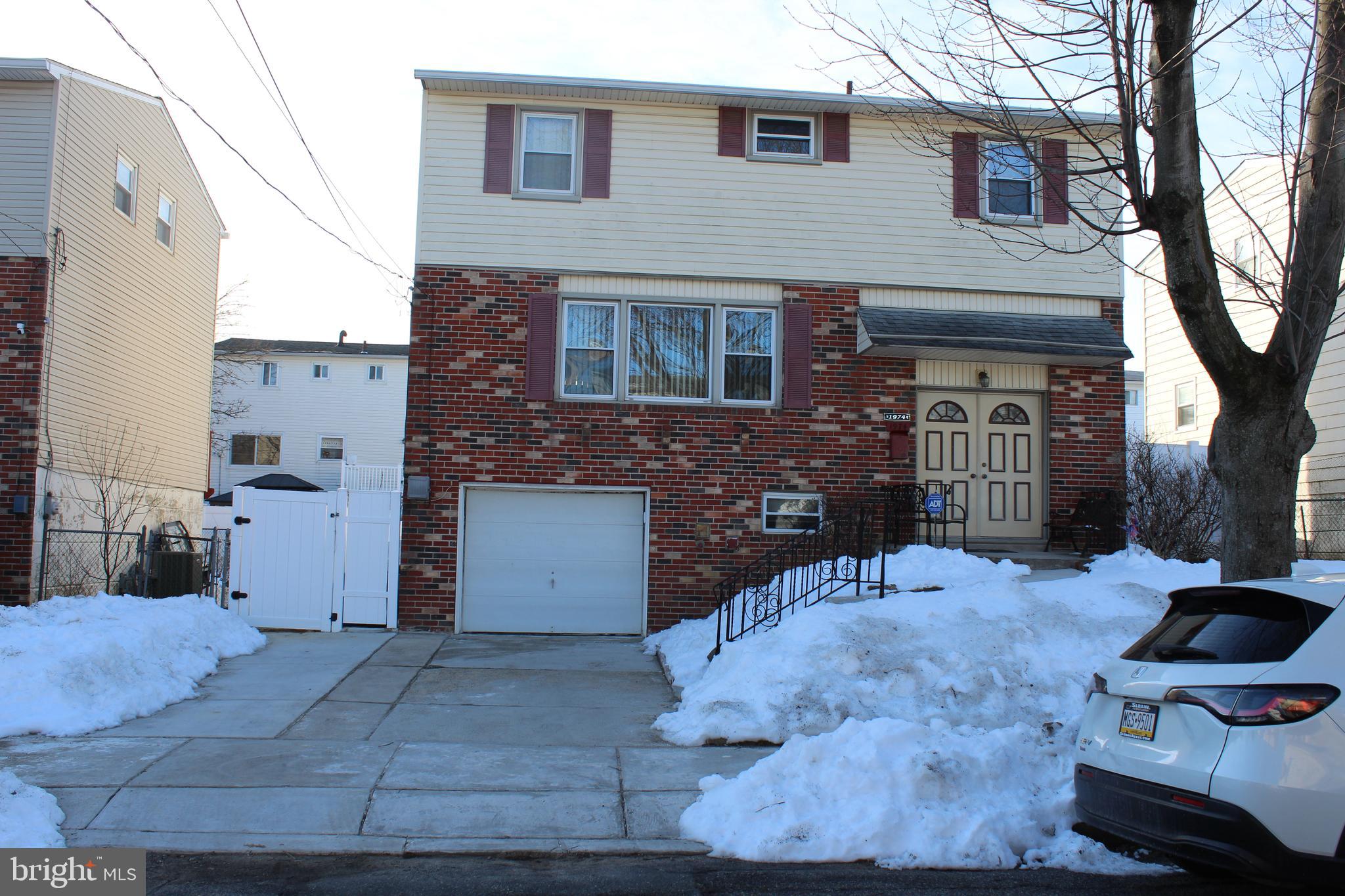 1974 King Arthur Road Philadelphia, PA 19116 - Photo 1 of 8 a view of a house with a yard