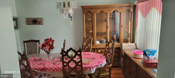 a view of a dining room with furniture