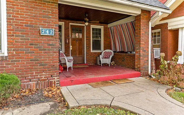 a backyard of a house with seating space