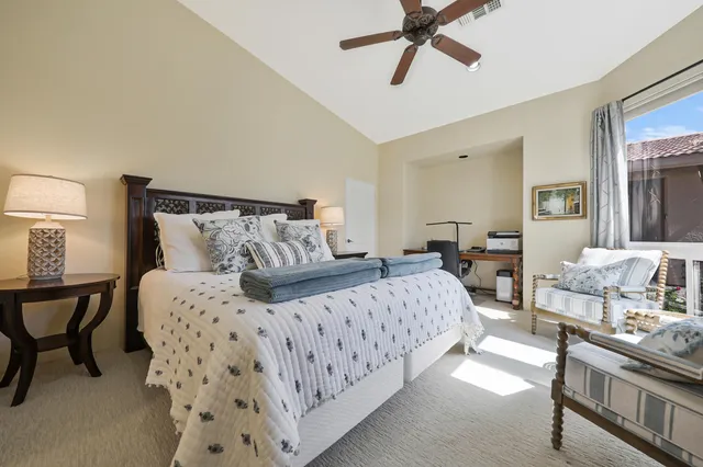 a view of an outdoor sitting area with golf course