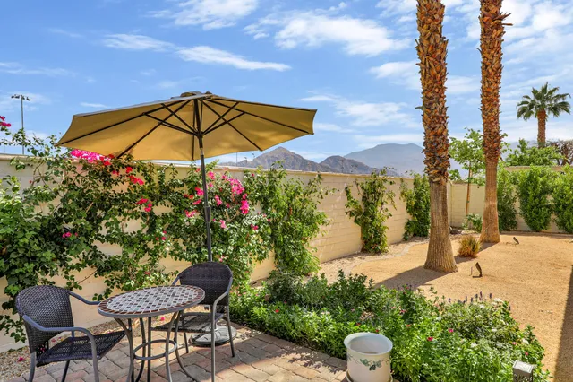 a house view with a garden space