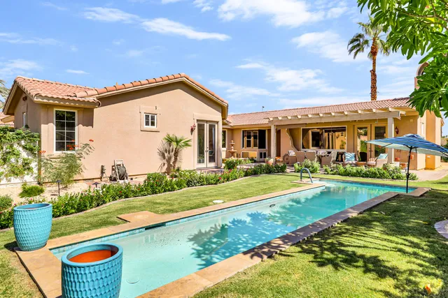 a house view with a garden space