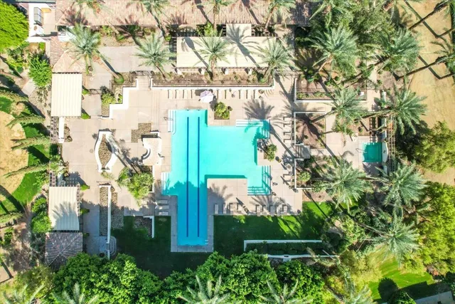 a living room with fireplace furniture and a flat screen tv