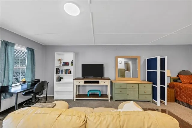 a bathroom with a sink and a window