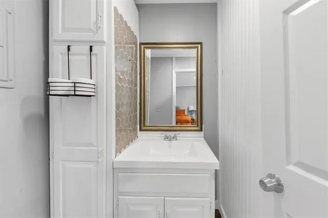 a view of a swimming pool with a yard