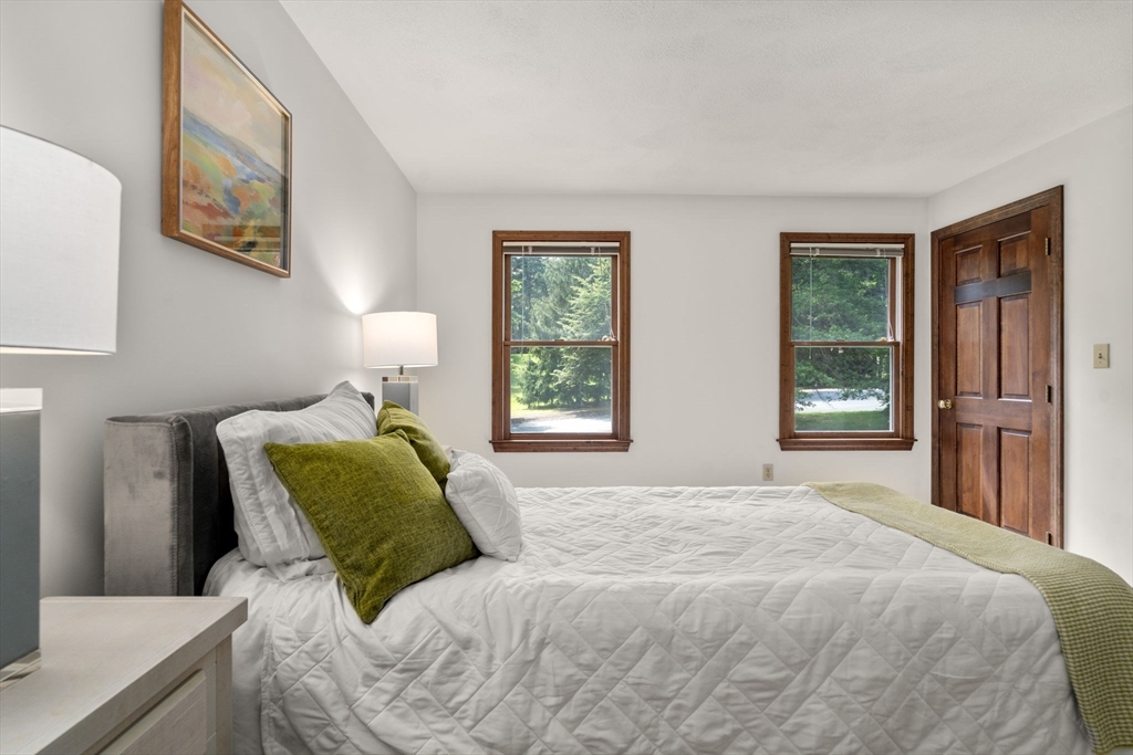 1 Maillet Drive Acton, MA 01720 - Photo 26 of 42 a bedroom with a bed and windows