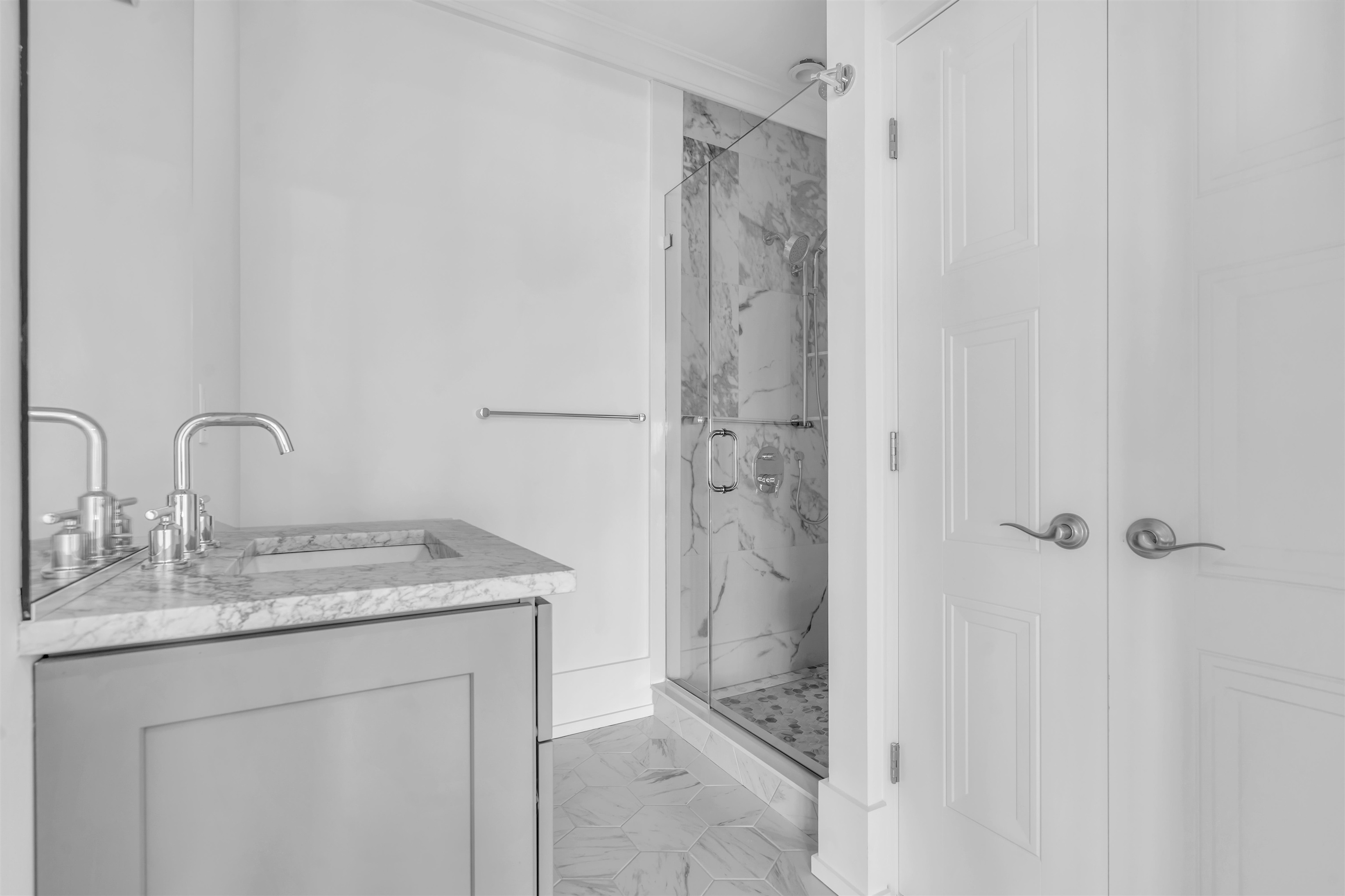 117 Taylor Strathmere, NJ 08248 - Photo 30 of 50 a bathroom with a granite countertop sink and a mirror