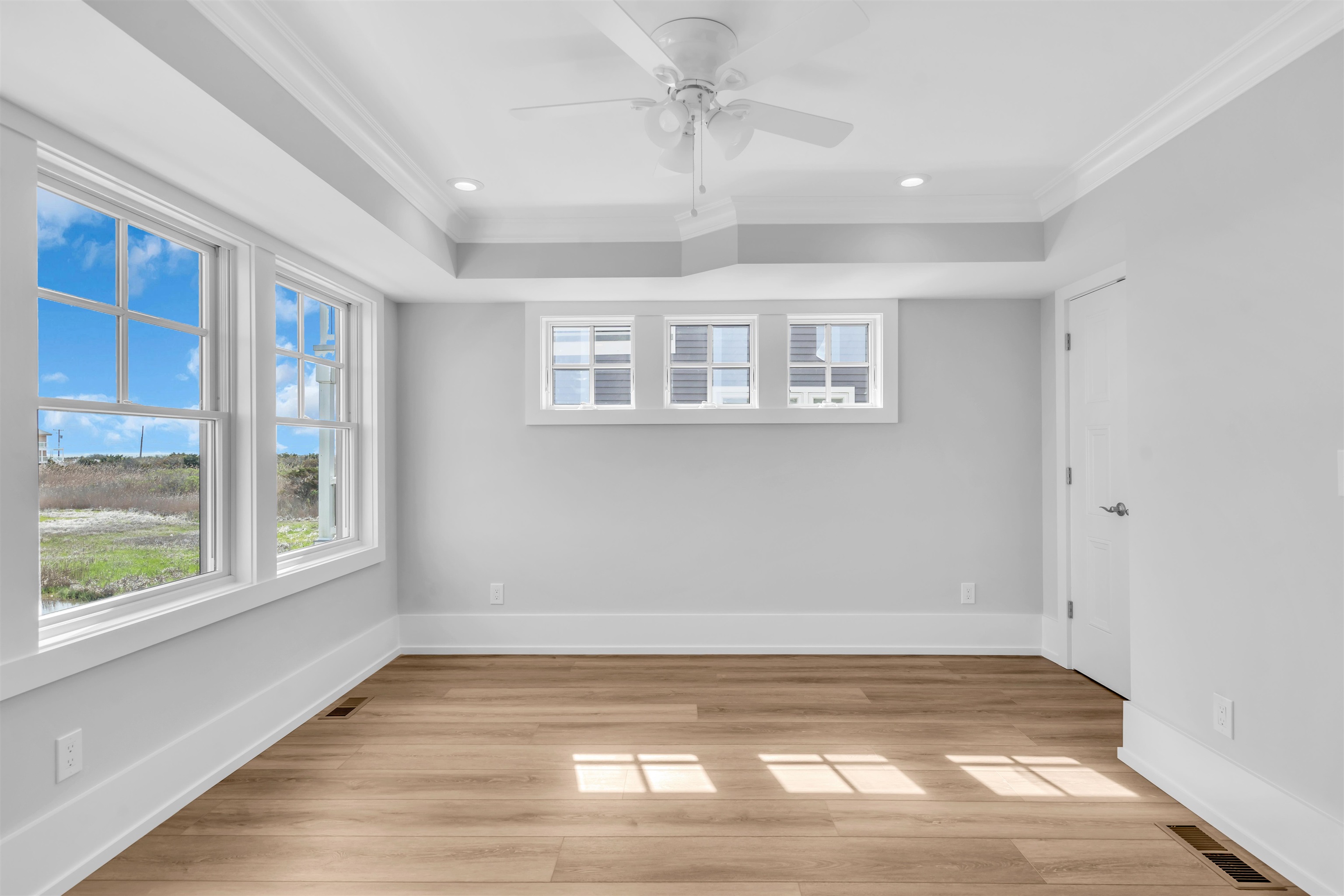 117 Taylor Strathmere, NJ 08248 - Photo 33 of 50 a view of empty room with wooden floor and fan