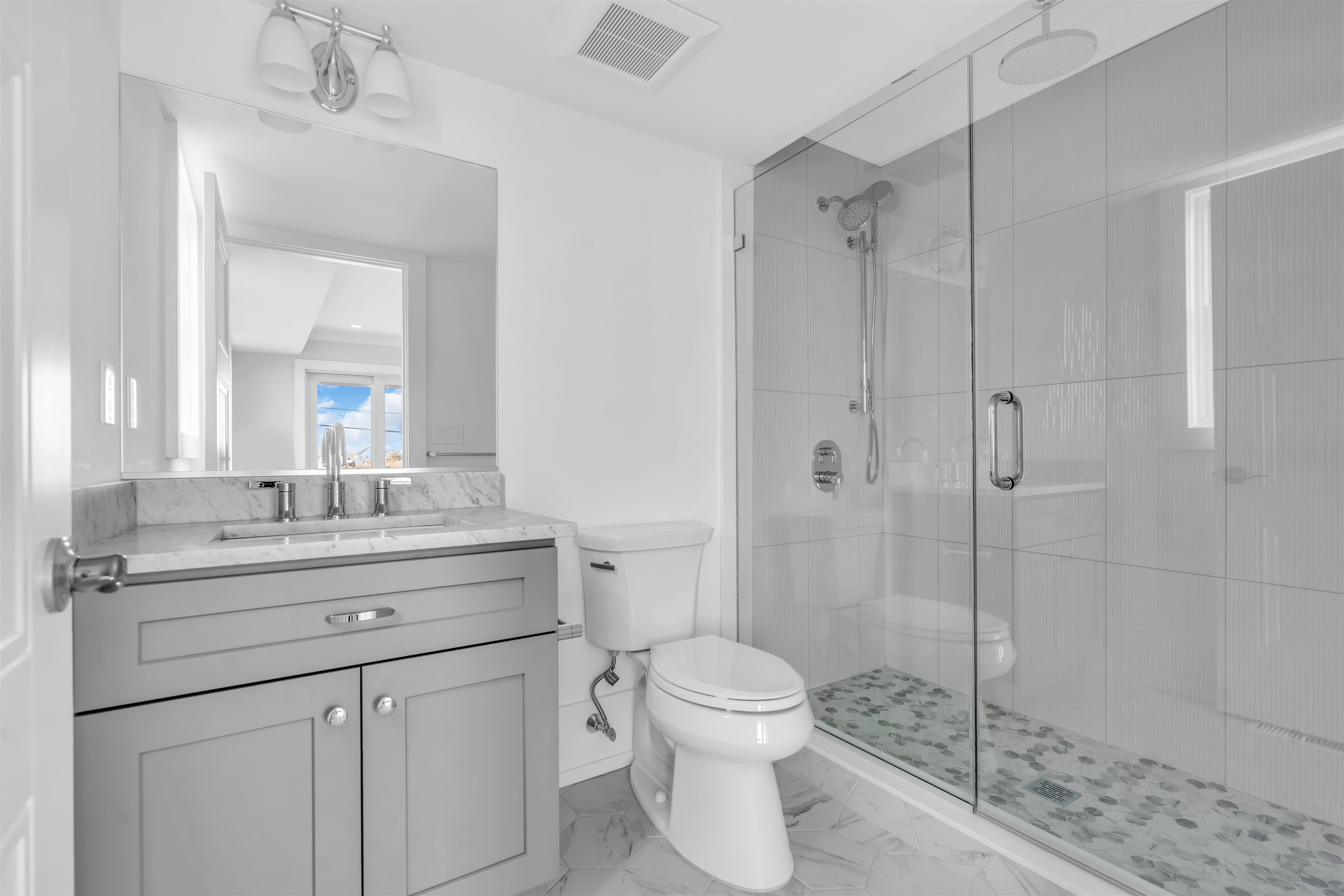 117 Taylor Strathmere, NJ 08248 - Photo 34 of 50 a bathroom with a shower sink vanity and toilet