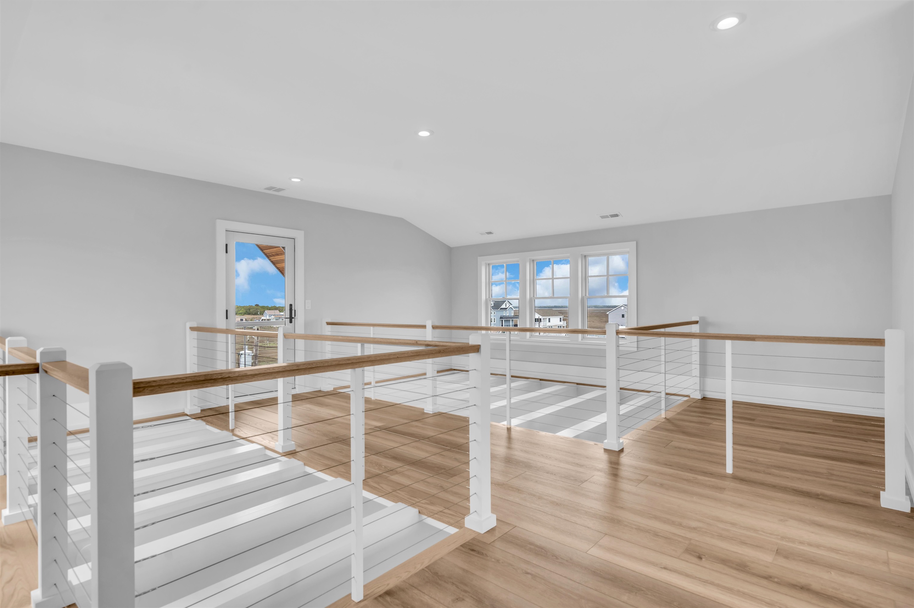 117 Taylor Strathmere, NJ 08248 - Photo 43 of 50 a view of a kitchen with wooden floor and staircase