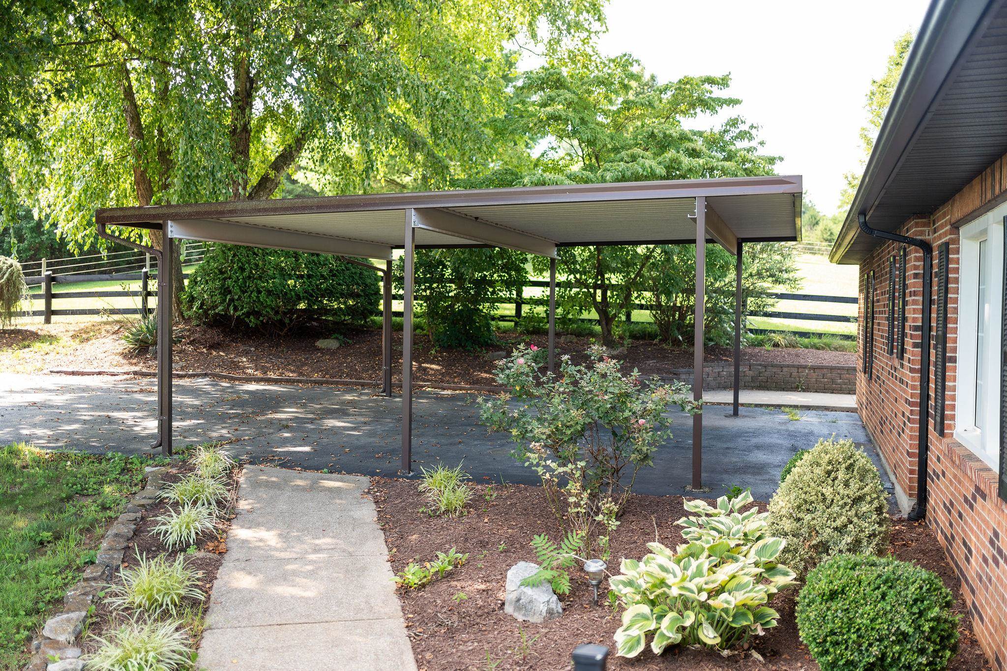 308 Stonewall Road Weyers Cave, VA 24486 - Photo 11 of 71 a view of a porch with a garden