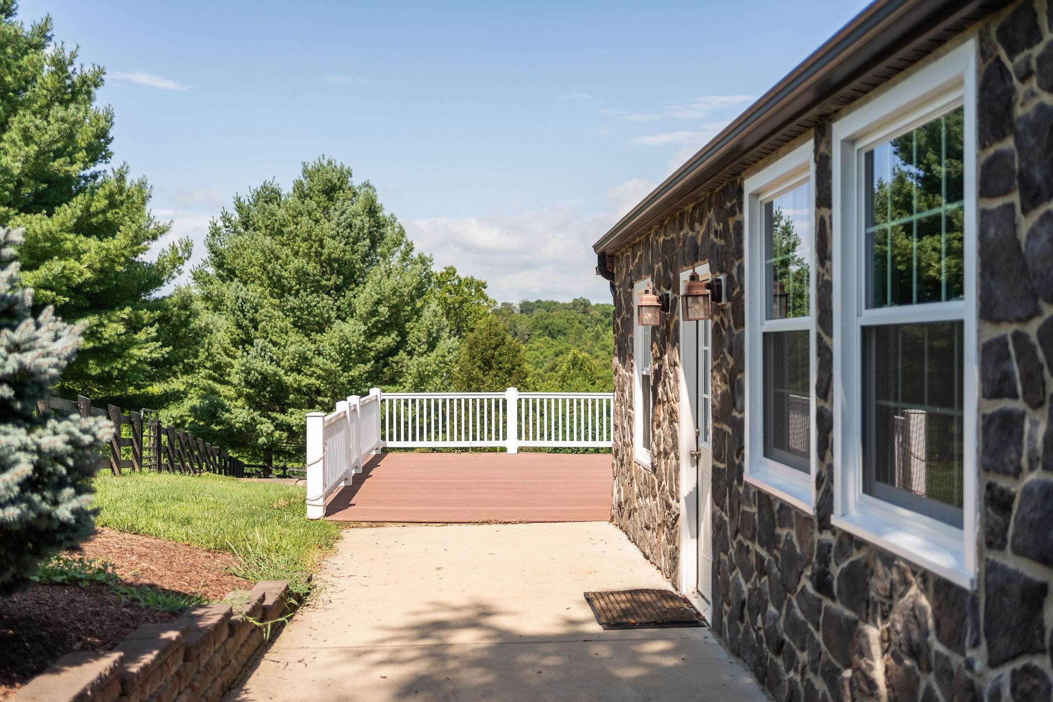 308 Stonewall Road Weyers Cave, VA 24486 - Photo 12 of 71 a house view with a garden space