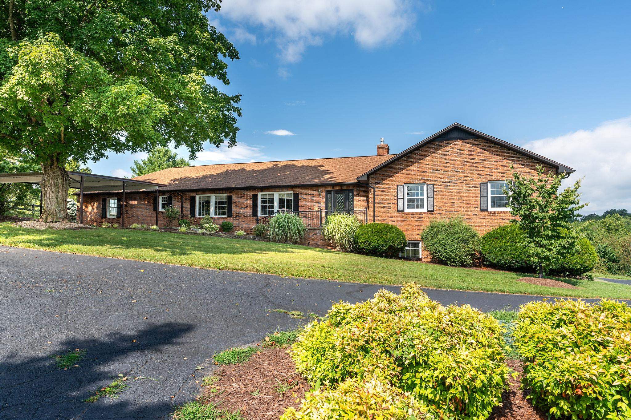 308 Stonewall Road Weyers Cave, VA 24486 - Photo 2 of 71 a front view of a house with a yard