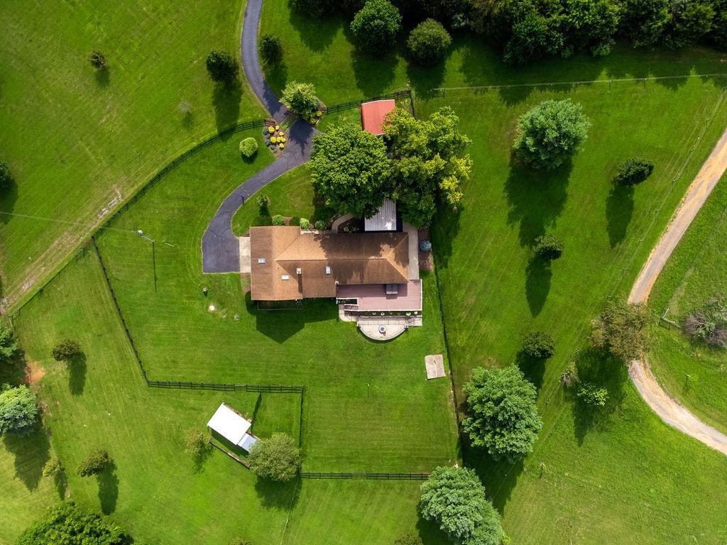 308 Stonewall Road Weyers Cave, VA 24486 - Photo 3 of 71 an aerial view of a house with a yard swimming pool outdoor seating and yard