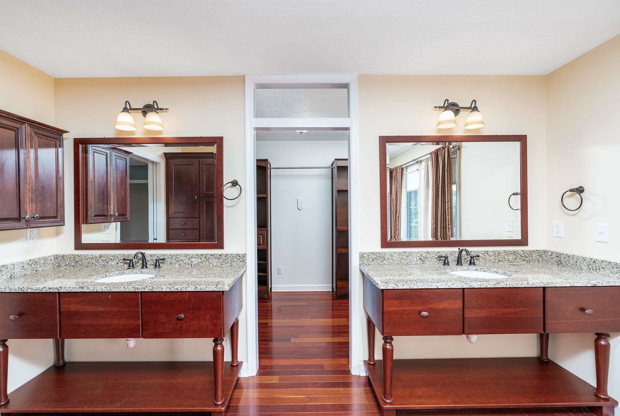 308 Stonewall Road Weyers Cave, VA 24486 - Photo 41 of 71 a en suite bathroom with a granite countertop sink and a mirror