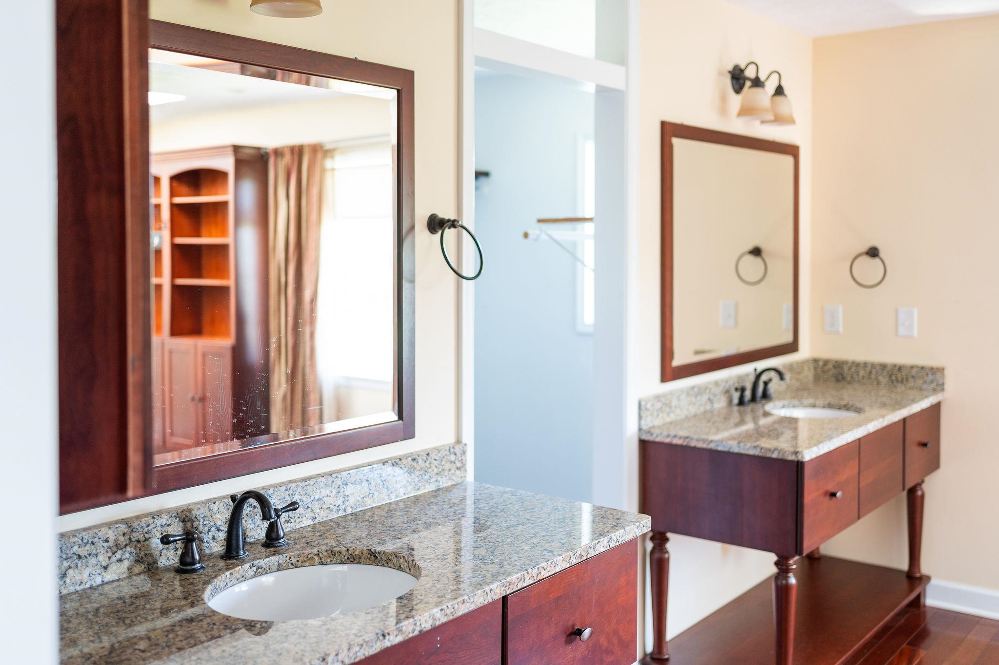 308 Stonewall Road Weyers Cave, VA 24486 - Photo 42 of 71 a bathroom with a granite countertop sink and a mirror
