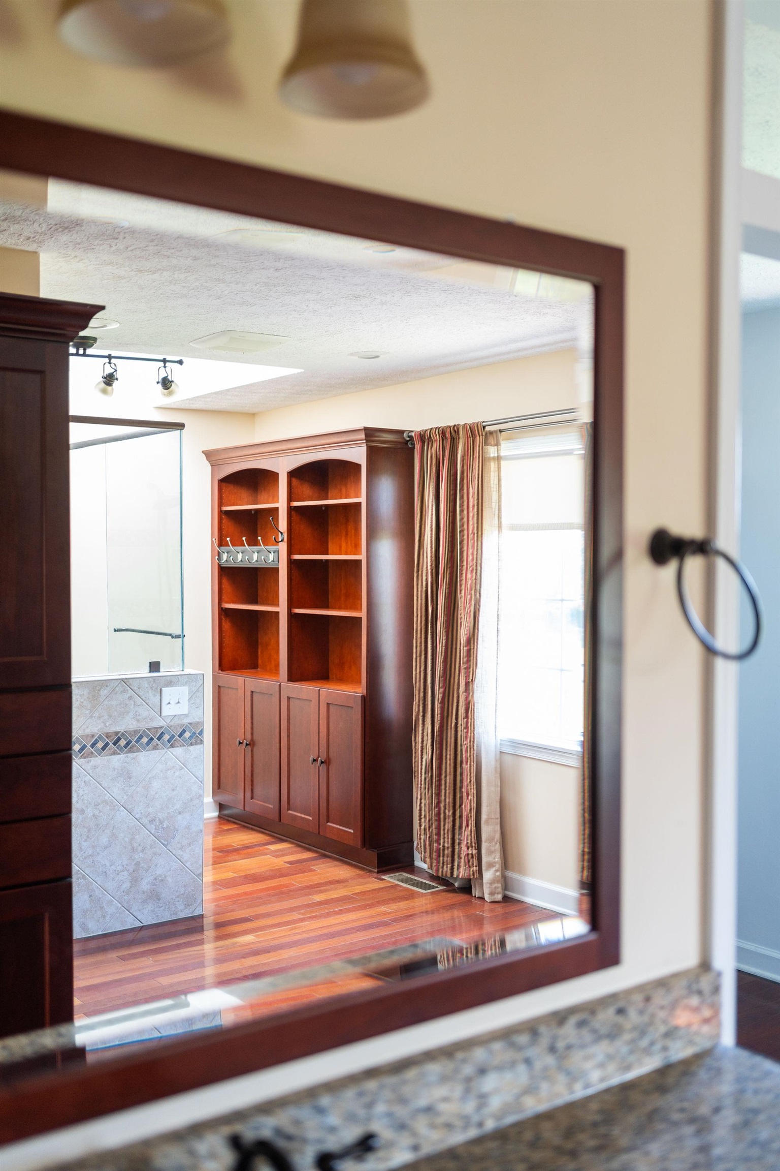 308 Stonewall Road Weyers Cave, VA 24486 - Photo 45 of 71 a view of an empty room with wooden floor and a window