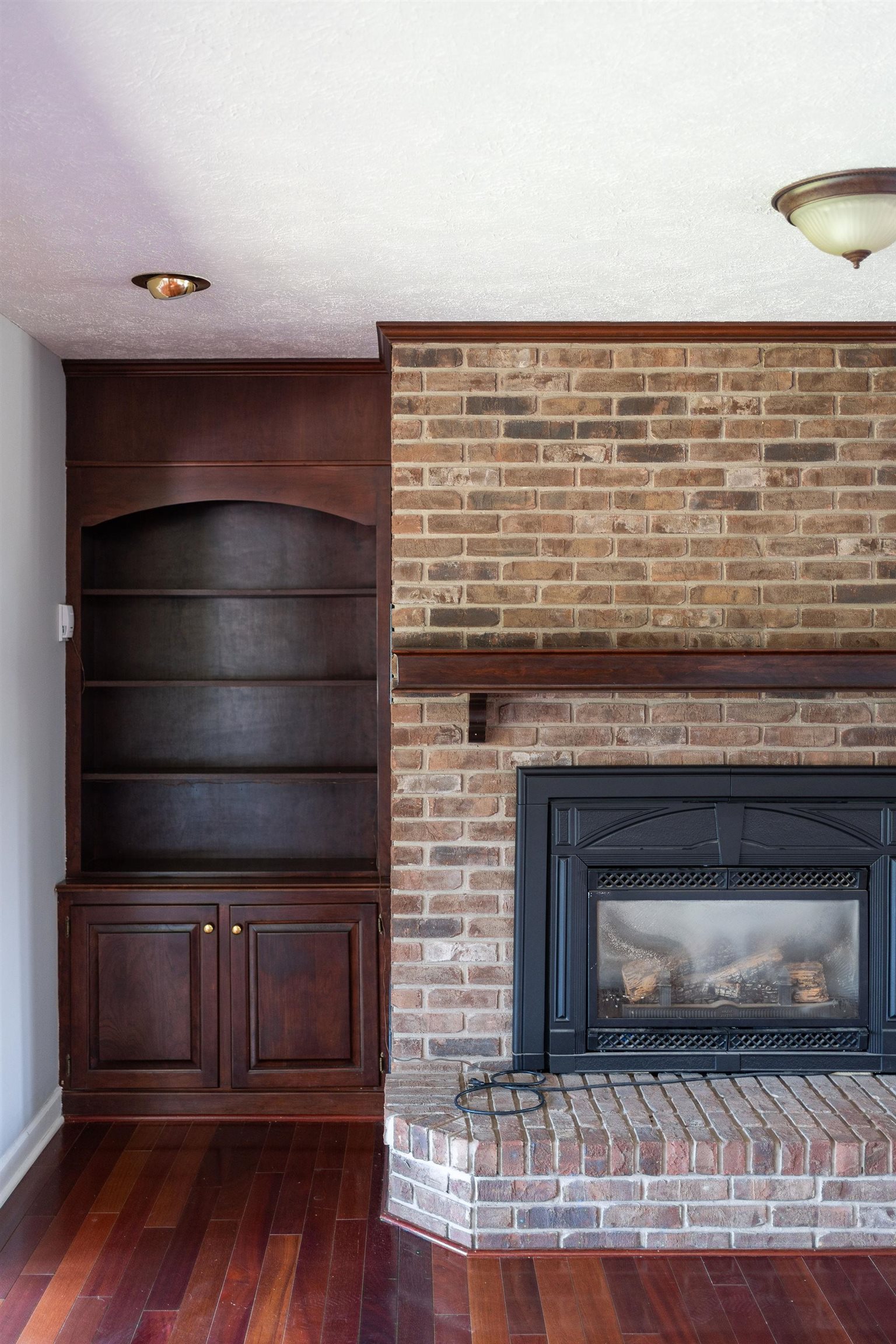 308 Stonewall Road Weyers Cave, VA 24486 - Photo 59 of 71 a fireplace with wooden floor