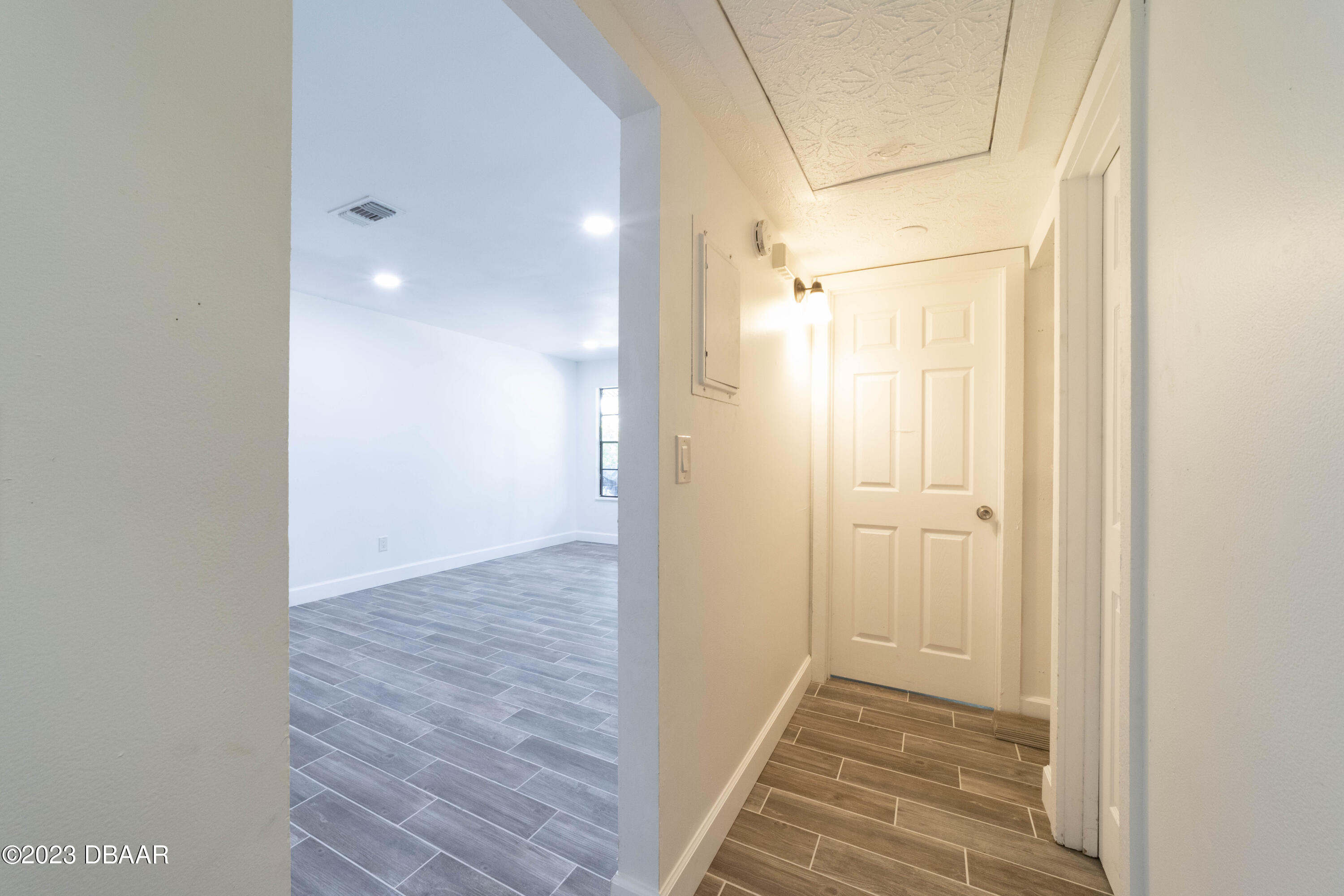 526 Live Oak Street, Unit 1050 Edgewater, FL 32132 - Photo 18 of 26 a view of a hallway with wooden floor