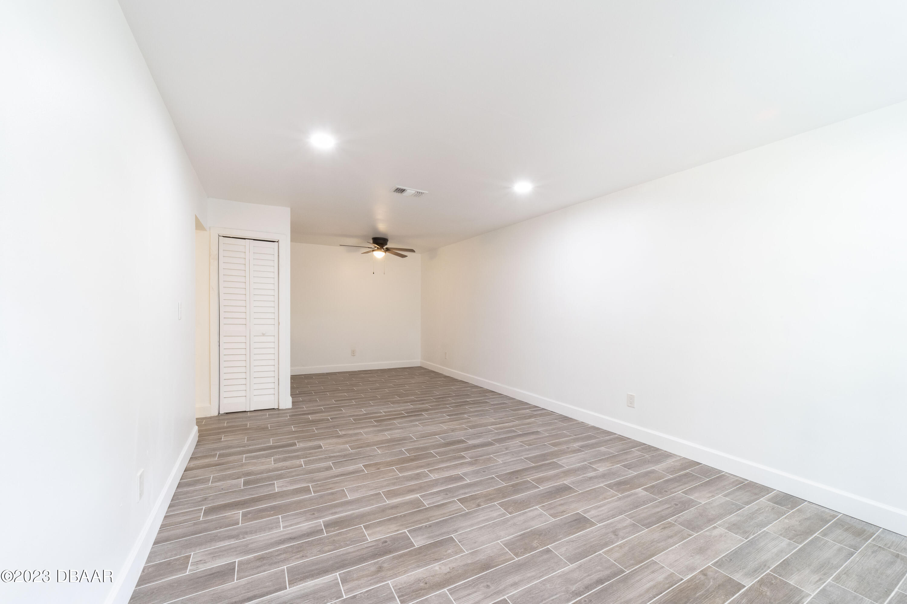 526 Live Oak Street, Unit 1050 Edgewater, FL 32132 - Photo 2 of 26 a view of an empty room