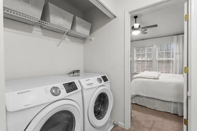 a utility room with dryer and washer