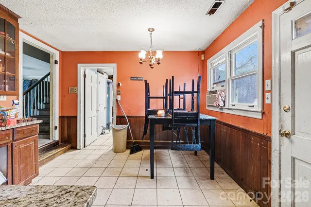 a view of a livingroom with furniture and window