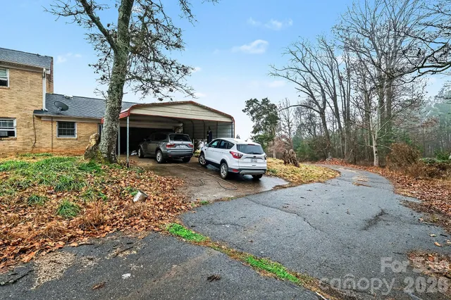 a view of street with parked cars