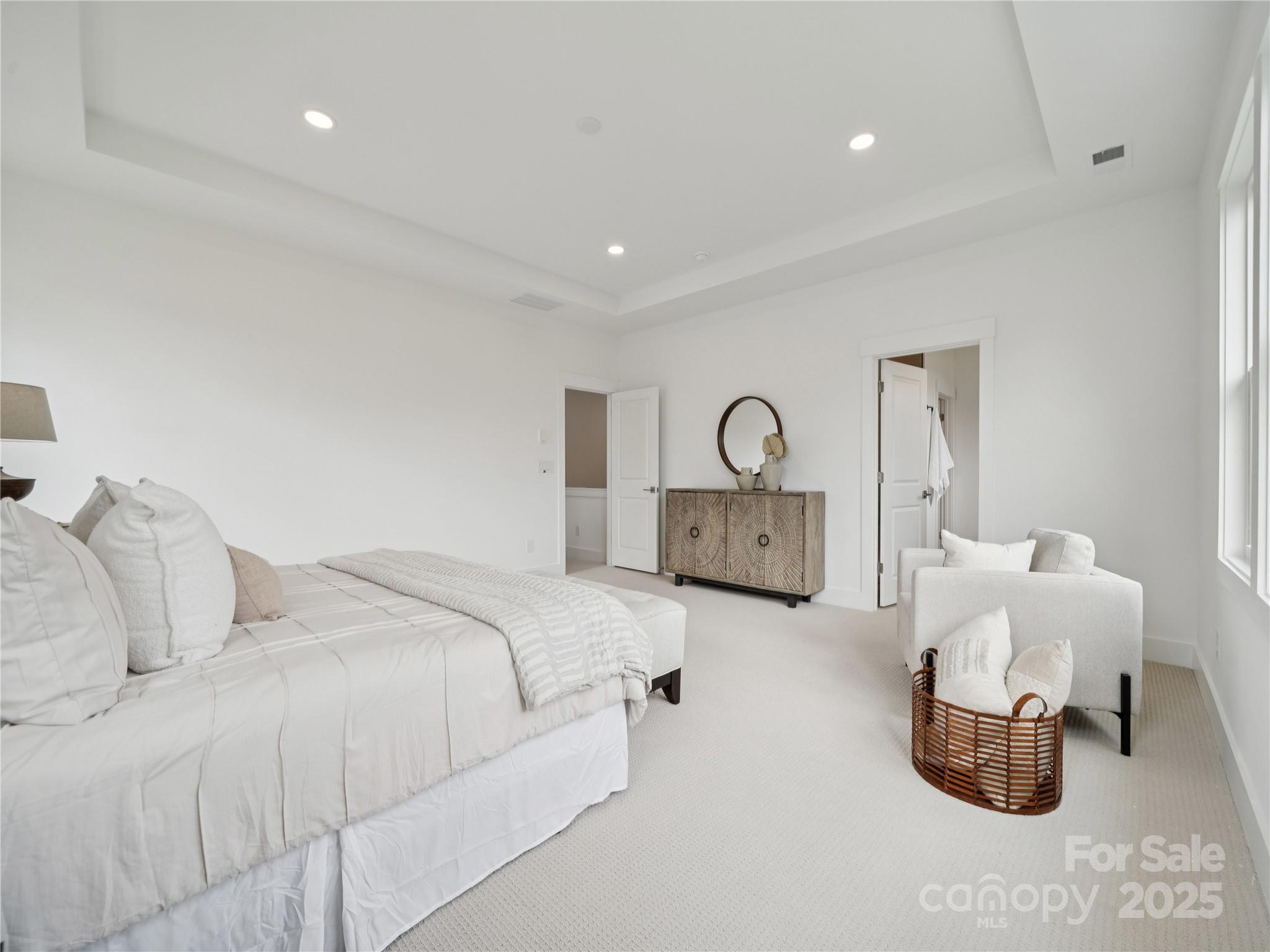 5311 Vernon Rdg Road, Unit 118 Huntersville, NC 28078 - Photo 16 of 22 a bedroom with a bed and gym equipment