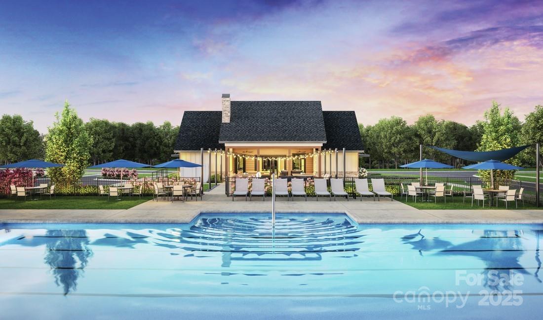 5311 Vernon Rdg Road, Unit 118 Huntersville, NC 28078 - Photo 20 of 22 a front view of a house with garden