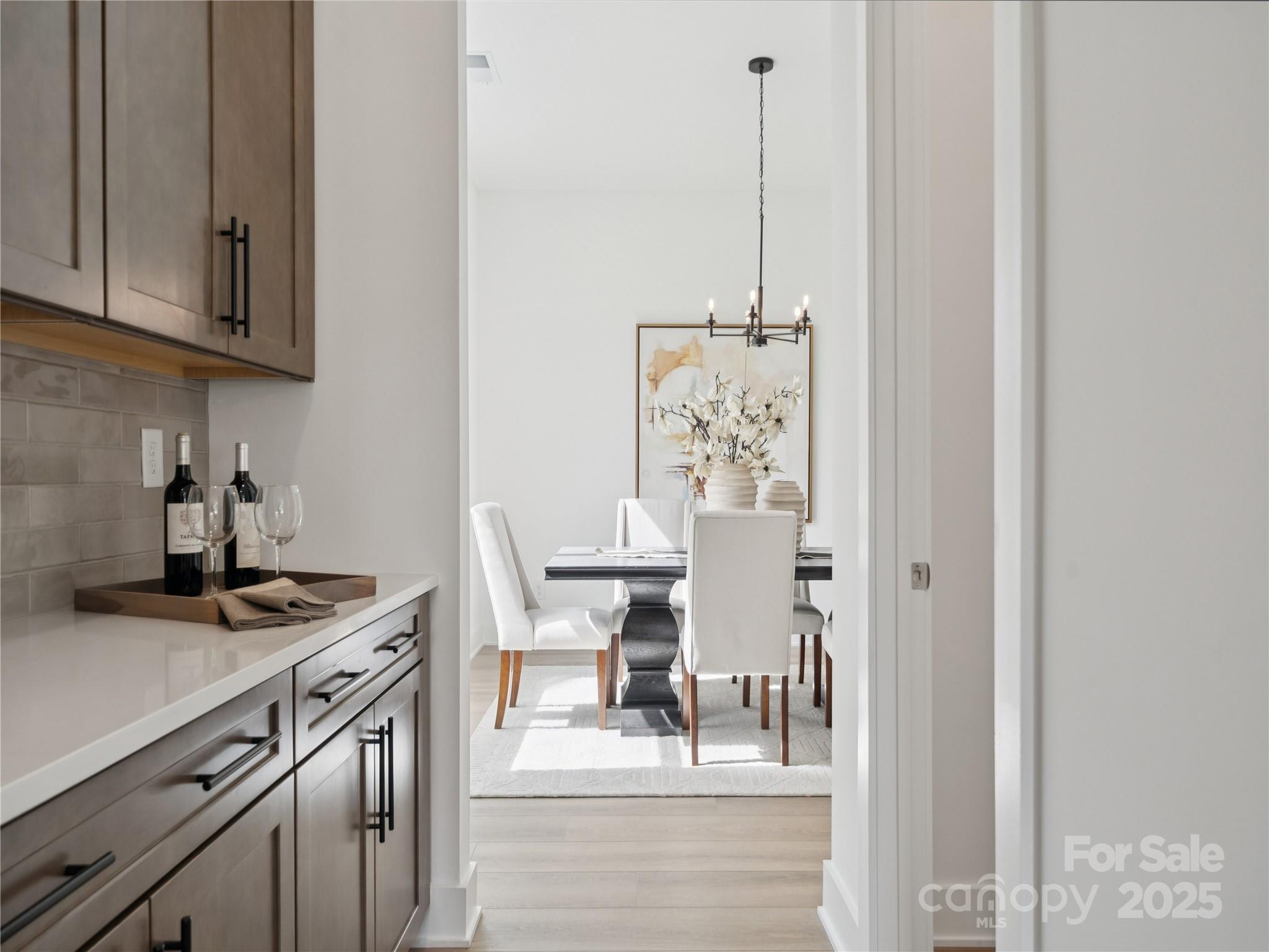 5311 Vernon Rdg Road, Unit 118 Huntersville, NC 28078 - Photo 8 of 22 a kitchen with stainless steel appliances granite countertop a stove and a white cabinets