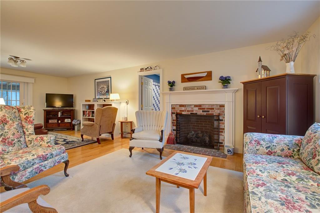 64 Walpole Meeting House Road Walpole, ME 04573 - Photo 10 of 35 Living room is large.