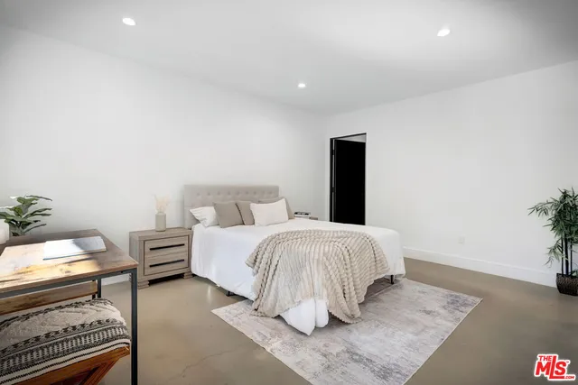 a view of a backyard with a small cabin