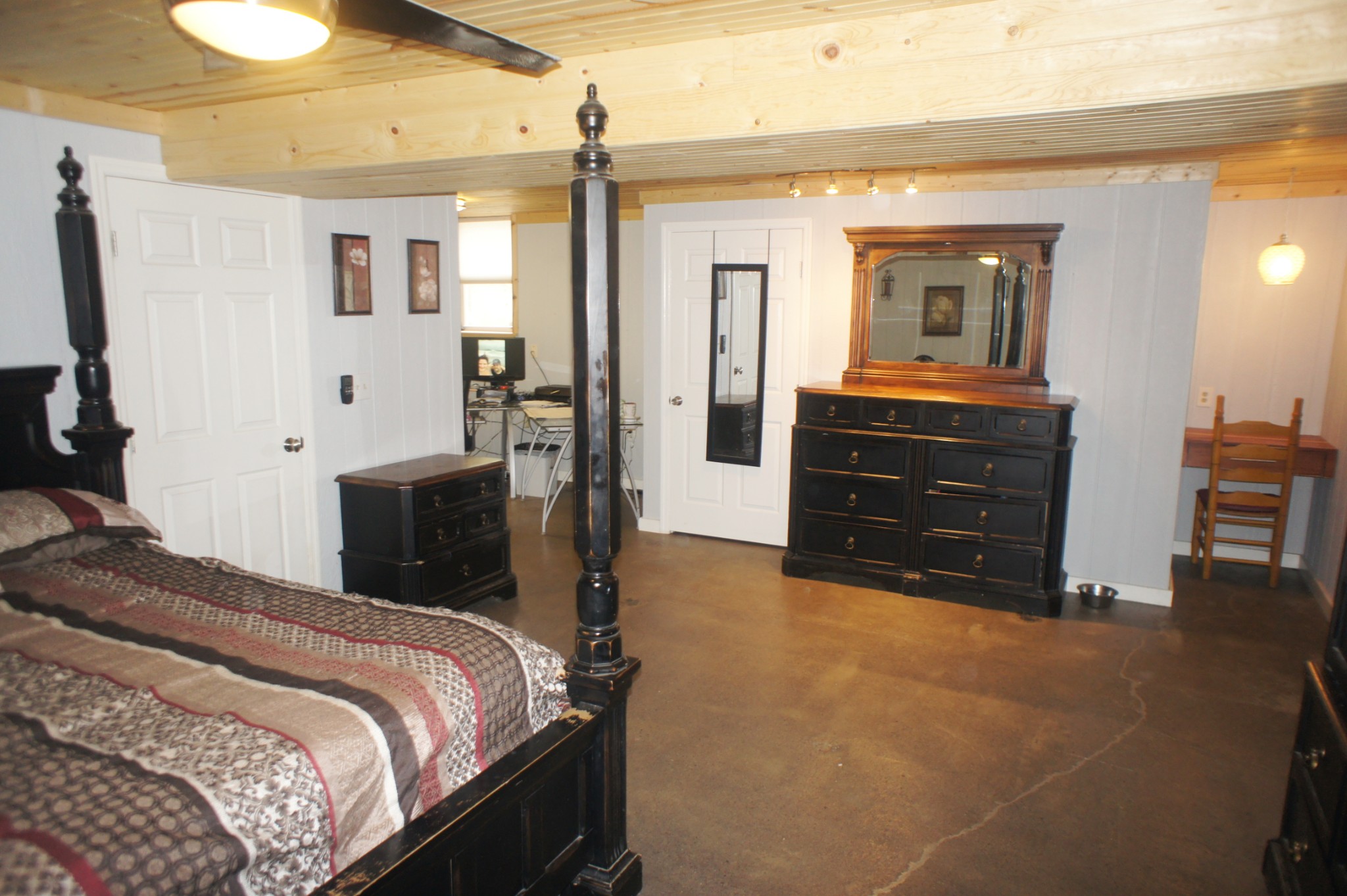 491 Academy Road Lebanon, TN 37087 - Photo 22 of 29 a bedroom with a bed and a mirror on dresser