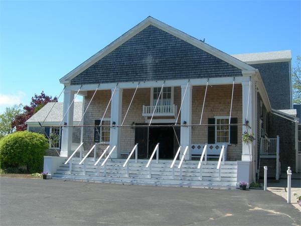 8 Red Cedar Circle Dennis, MA 02638 - Photo 13 of 18 a front view of a house with garage
