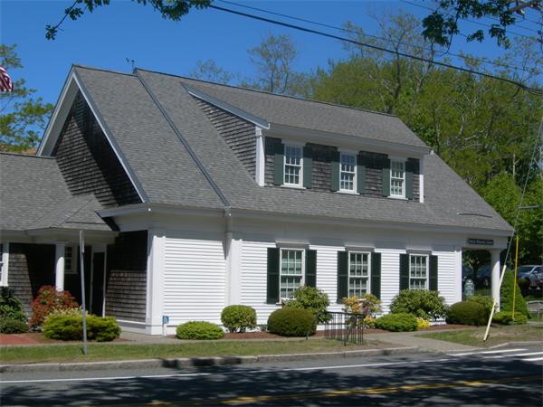 8 Red Cedar Circle Dennis, MA 02638 - Photo 15 of 18 a front view of a house with garden