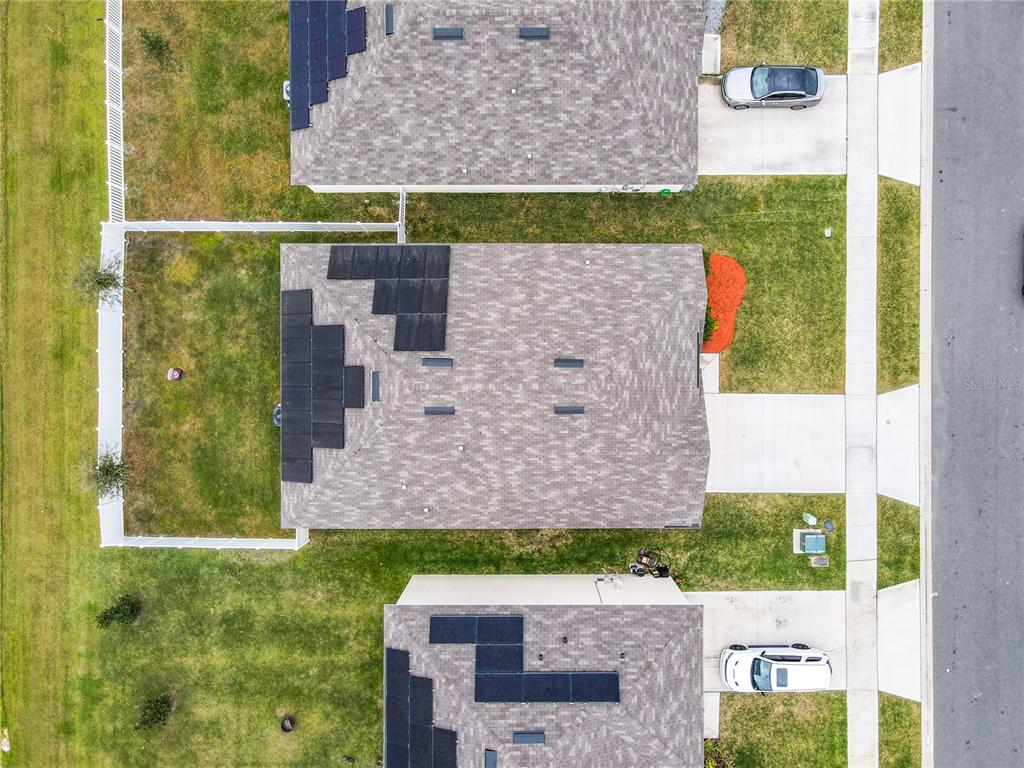 2607 Elmbrooke Way Edgewater, FL 32141 - Photo 23 of 52 front view of a house with a yard