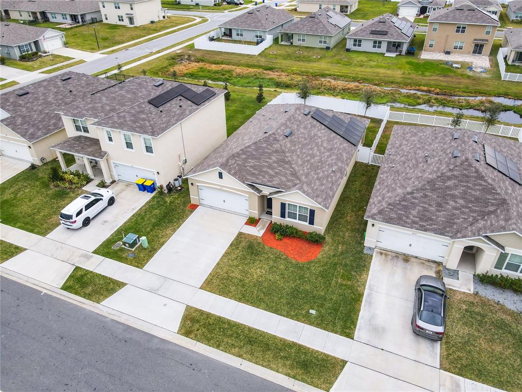 2607 Elmbrooke Way Edgewater, FL 32141 - Photo 48 of 52 an aerial view of a house with a garden
