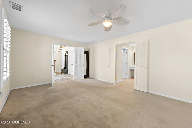 a kitchen with stainless steel appliances granite countertop a sink stove and wooden floor