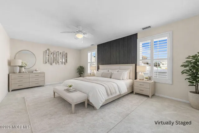 a view of a storage & utility room with dryer and washer
