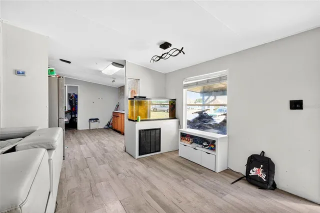 a view of a livingroom with furniture and furniture